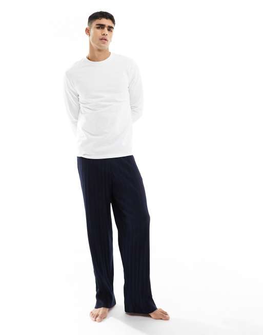  ASOS DESIGN pyjama set with long sleeve white t-shirt and ribbed navy bottoms