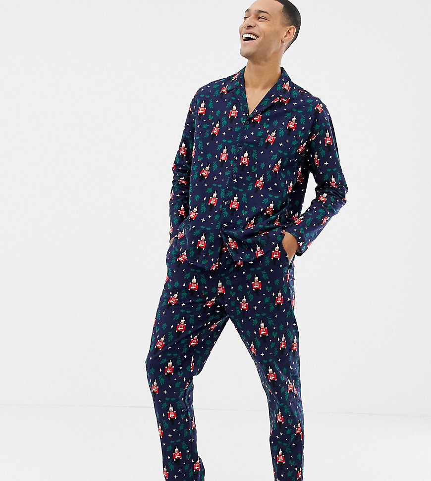 ASOS DESIGN – Pyjamas för honom och henne med nötknäpparmönster-Marinblå