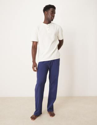 ASOS DESIGN pyjamas with henley neck in navy and white waffle
