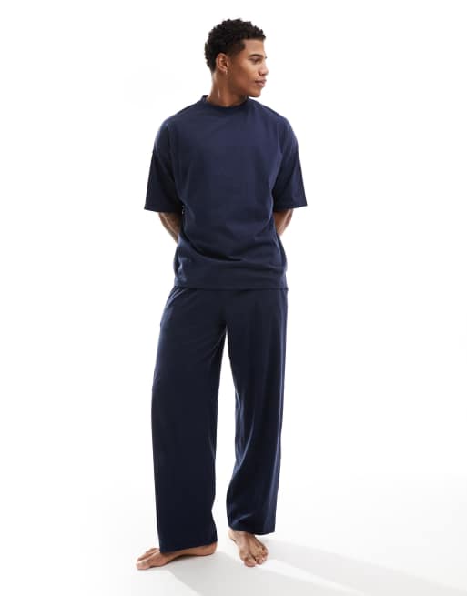 ASOS DESIGN - Pyjamaset van jersey met oversized T-shirt en broek in marineblauw
