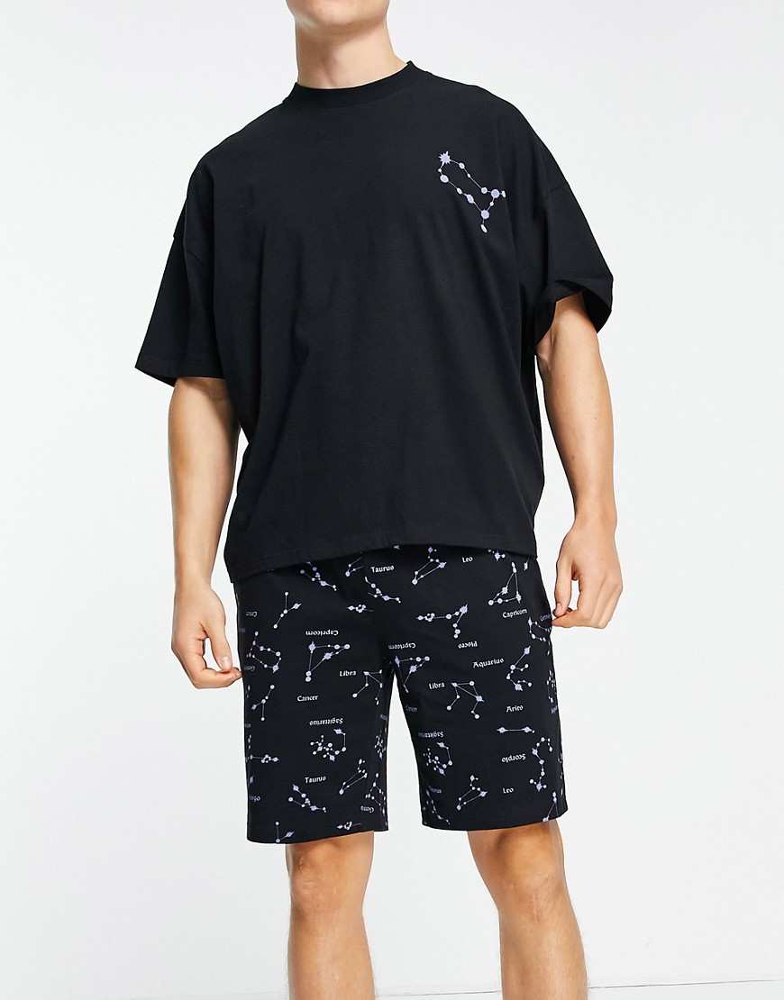 ASOS DESIGN - Pyjamassæt med lounge-T-shirt og shorts med stjerneprint i sort
