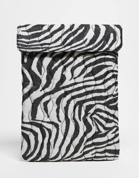 ASOS DESIGN quilted laptop sleeve in zebra print - view 1