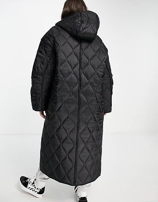 ASOS DESIGN longline puffer jacket in black monogram print
