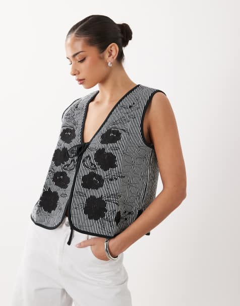 ASOS DESIGN quilted stripe waistcoat with embroidered floral design in black and white - view 1