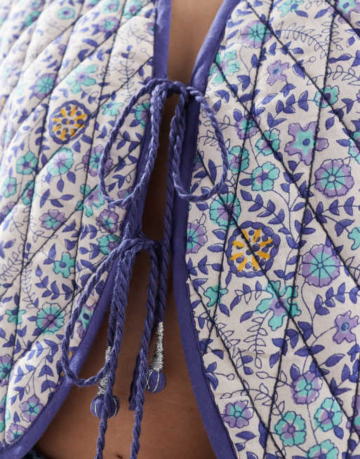 ASOS DESIGN quilted tie front vest in floral print