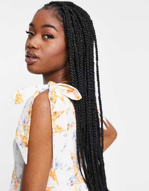 ASOS DESIGN quilted tie shoulder smock playsuit in mixed floral print, 4 of 4