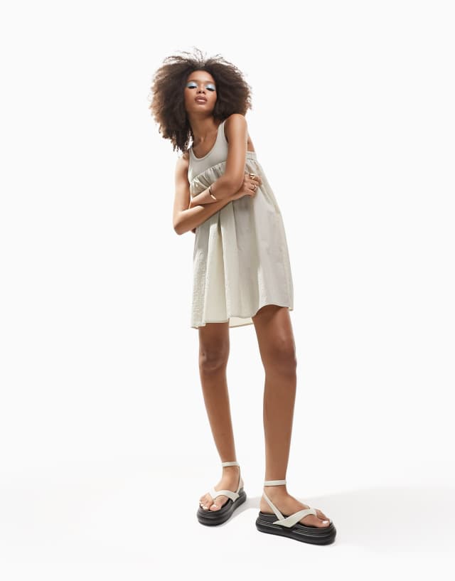 ASOS DESIGN racer 2 in 1 mini smock dress with puff skirt in stone