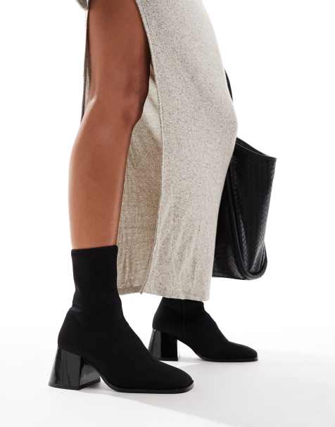 ASOS DESIGN – Radiant – Svarta boots i neopren med utsvängd blockklack - view 1
