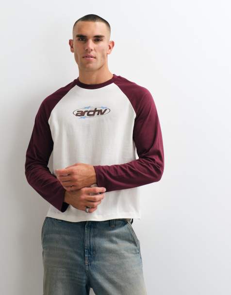 ASOS DESIGN raglan boxig avslappnad t-shirt med textgrafik framtill i vitt - view 1