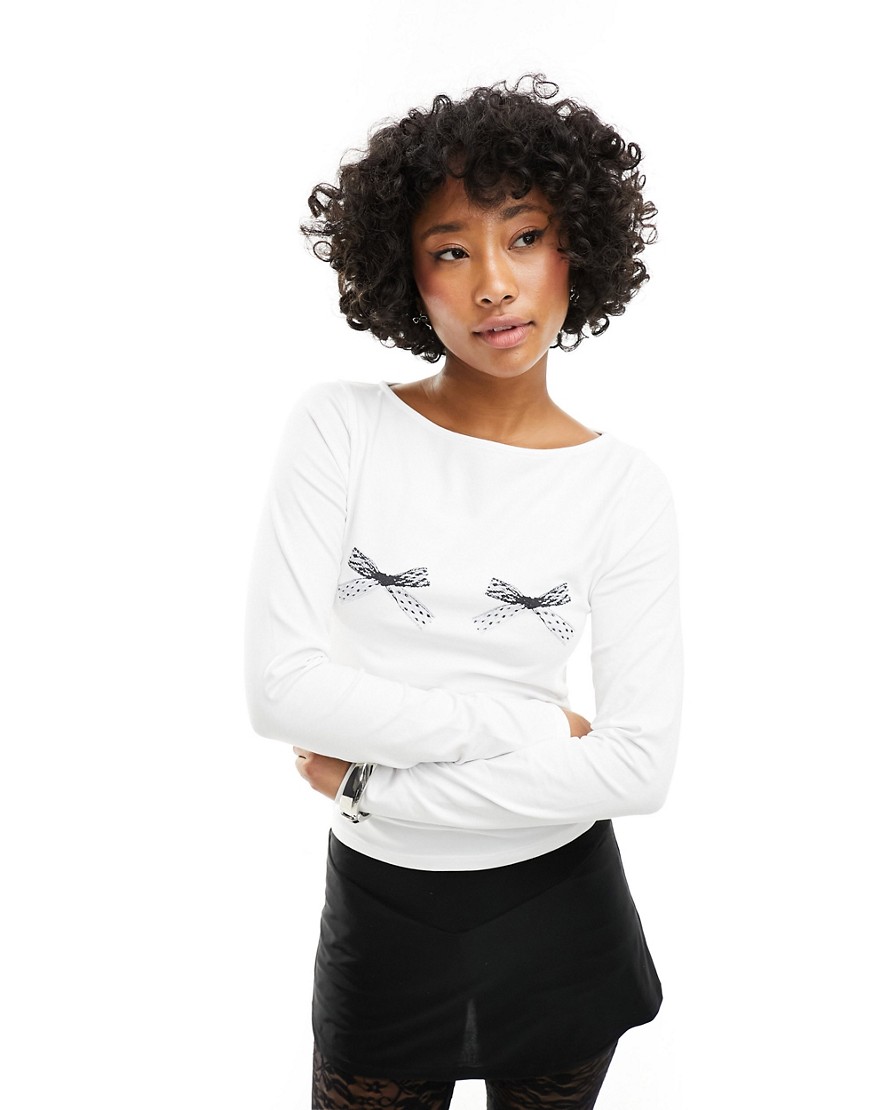 ASOS DESIGN raglan long sleeve top with bow graphic in ivory-White