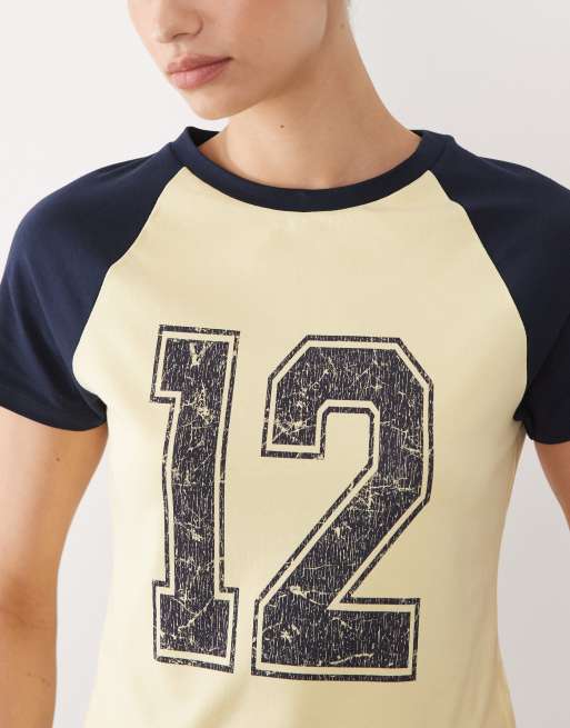 ASOS DESIGN raglan sleeve baby tee with distressed 12 graphic in buttermilk and navy, 3 of 4