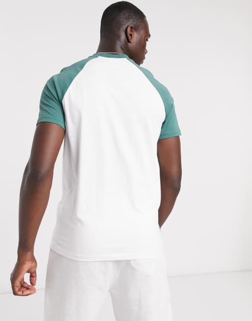 white t shirt with green sleeves