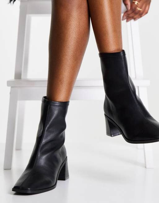 ASOS DESIGN Raider mid-heel ankle boots in black