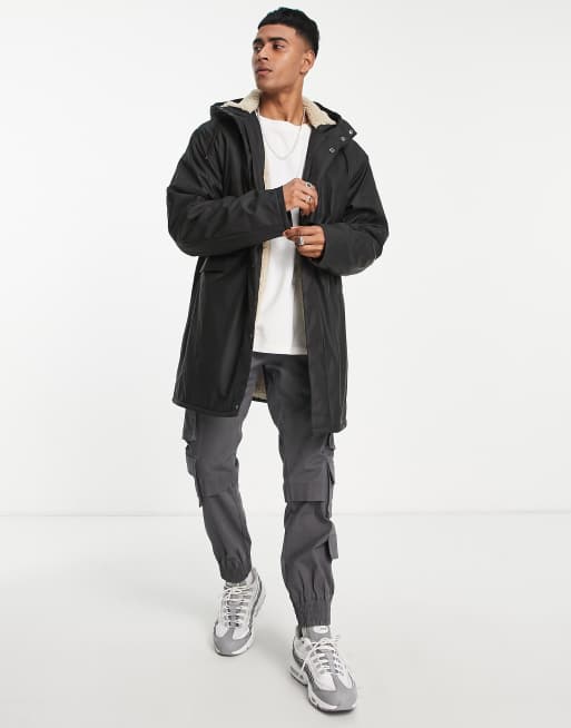 ASOS DESIGN rain jacket in black with borg lining