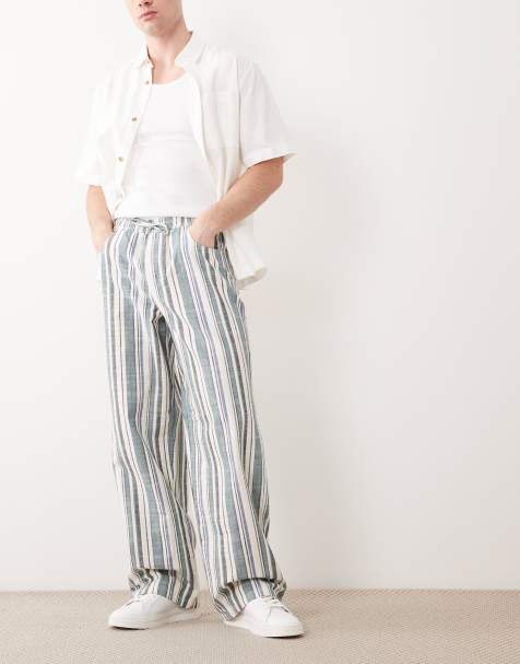 ASOS DESIGN – Randiga, elastiska byxor i baggy fit - view 1