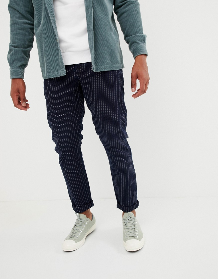 ASOS DESIGN – Randiga, indigoblå slim jeans