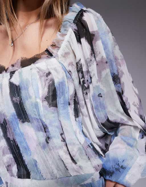 ASOS DESIGN raw edge panelled mini dress with blouson sleeves in abstract print