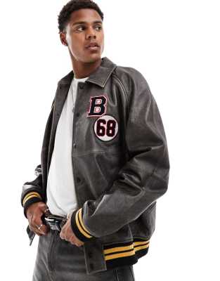 ASOS DESIGN real leather bomber jacket with varsity badging in black wash