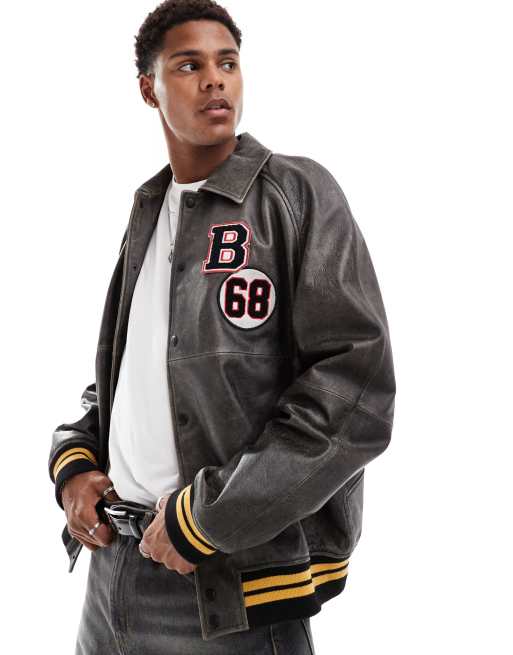 ASOS DESIGN real leather bomber jacket with varsity badging in black wash ASOS