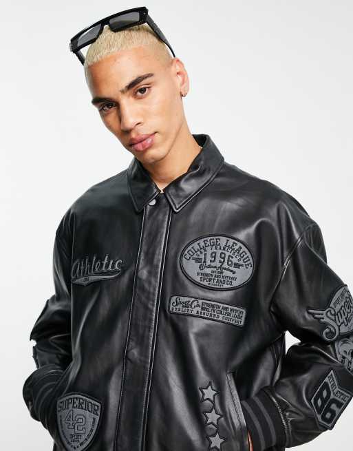 ASOS DESIGN oversized varsity bomber jacket in navy with faux leather  sleeves