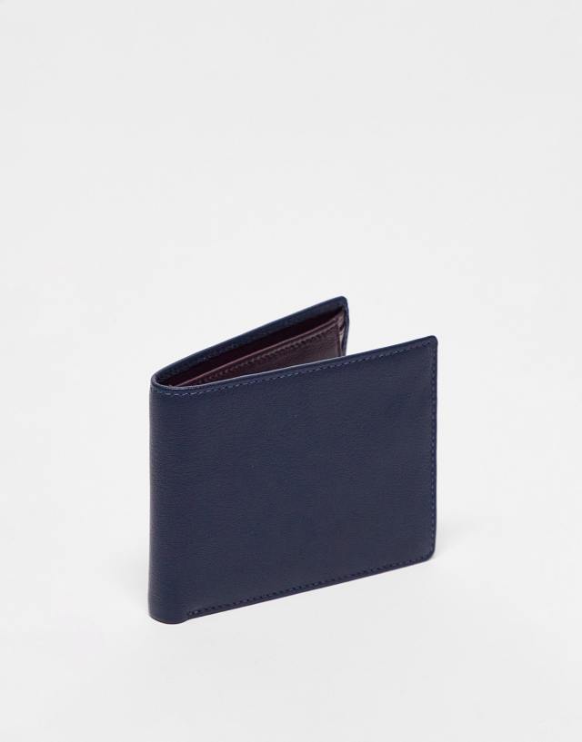 ASOS DESIGN real leather wallet in navy with deep purple internals