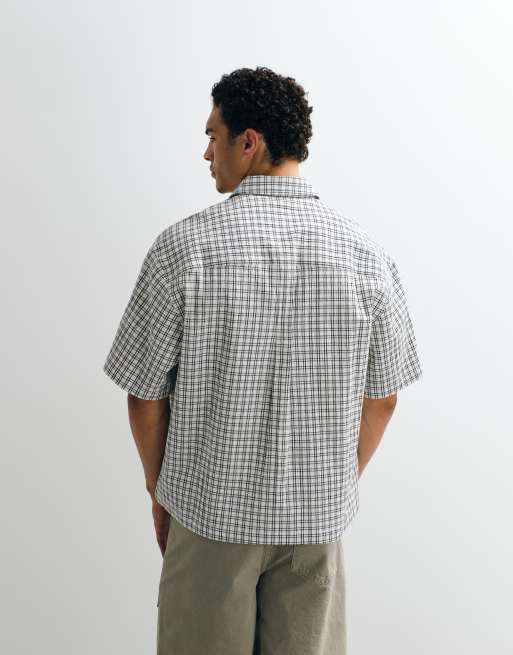 ASOS DESIGN - Recht oversized geruit overhemd met print op de borst in zwart en wit, 5 van 9