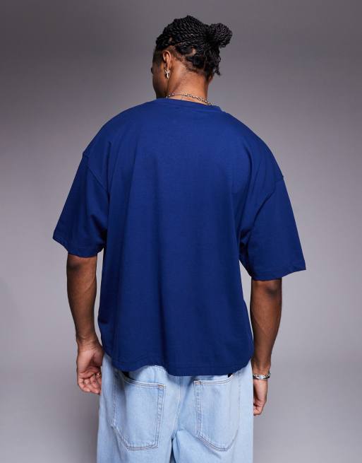 ASOS DESIGN boxy oversized t-shirt with athletic graphic in navy