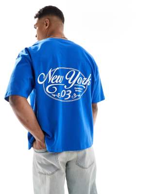 ASOS DESIGN - Recht oversized T-shirt van zware stof met stadsprint in blauw - view 1