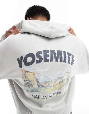 ASOS DESIGN - Rechte oversized hoodie met print op de achterkant in grijs - view 1