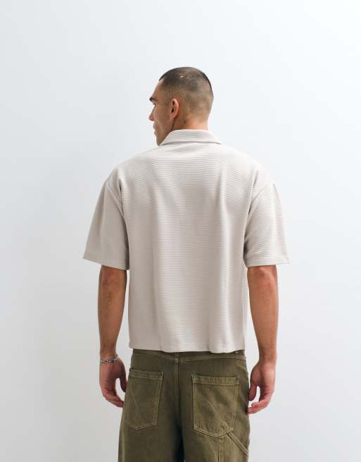 ASOS DESIGN - Rechte oversized polo van superzware geribbelde stof met voetbalprint in gebroken wit, 5 van 5