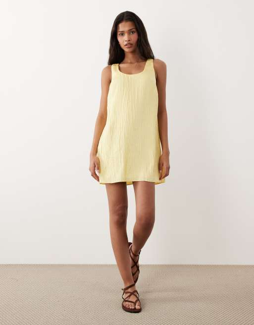 ASOS DESIGN - Rechtvallende mini-jurk met strik op de rug in geel, 2 van 4
