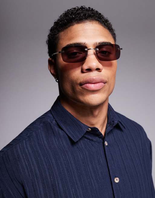 ASOS DESIGN rectangle rimless sunglasses with burgundy lens and gold temples