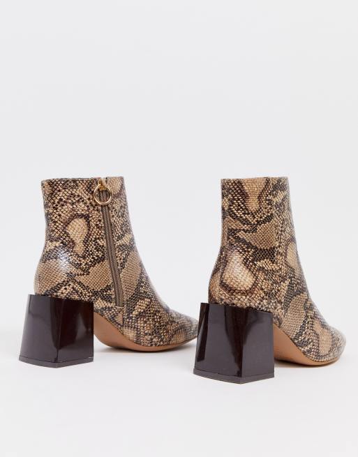 ASOS DESIGN Reed heeled ankle boots in natural snake