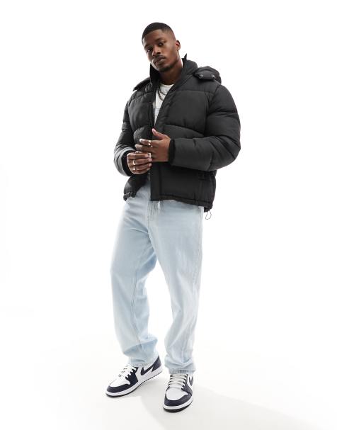 ASOS DESIGN – Regenabweisende Pufferjacke in Schwarz mit abnehmbarer Kapuze - view 1
