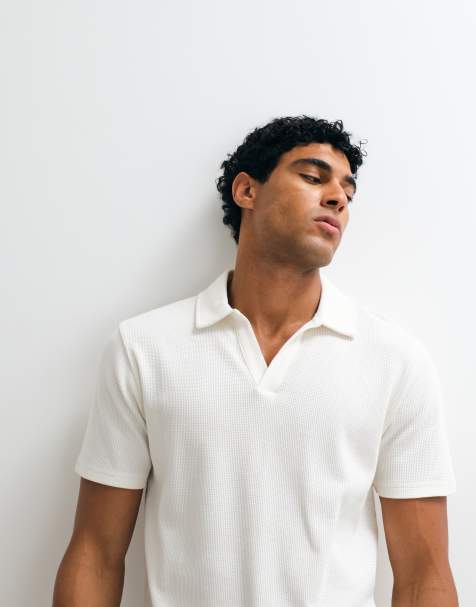 ASOS DESIGN – Regular-Fit-Polohemd in Cremeweiß mit Reverskragen und Waffelstruktur - view 1
