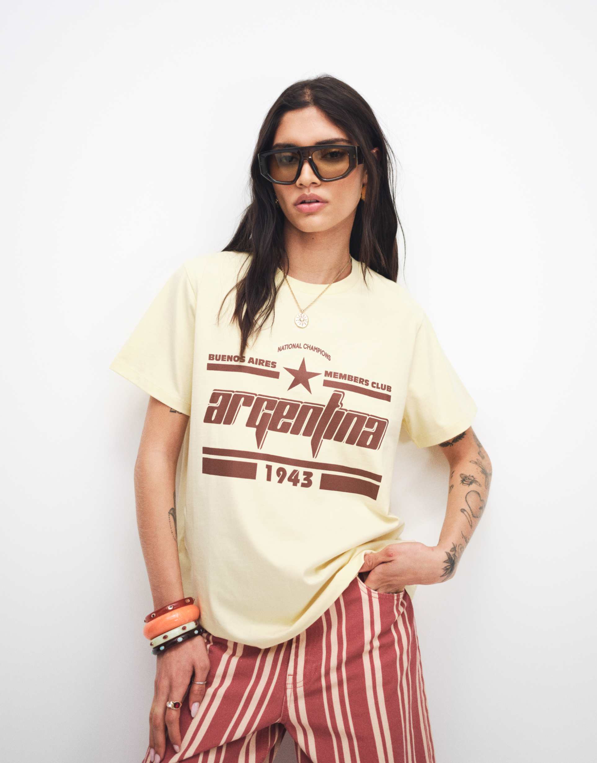 asos design regular fit t-shirt with argentina graphic in chocolate and lemon