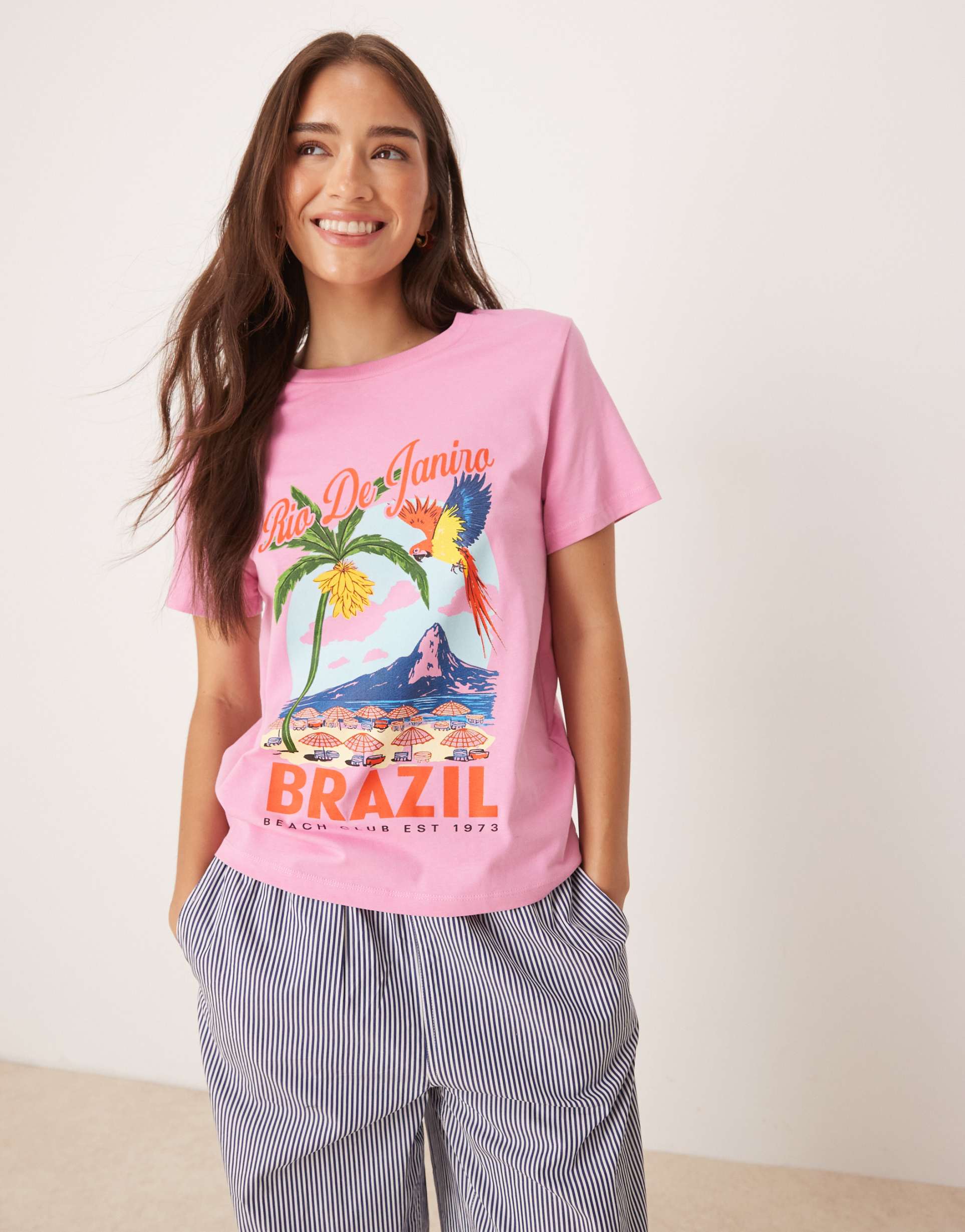 asos design regular fit t-shirt with brazil beach graphic in pink