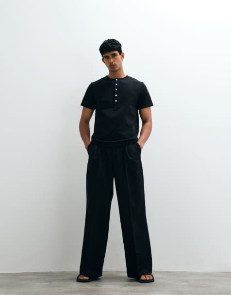 ASOS DESIGN regular fit T-shirt with contrast henley neck in black - view 1
