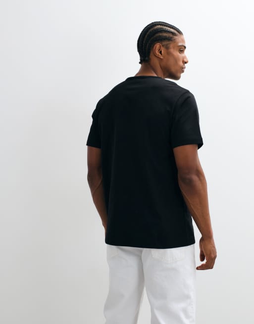 ASOS DESIGN regular fit t-shirt with contrast henley neck in black, 5 of 5