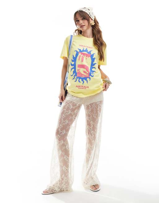 ASOS DESIGN regular fit t-shirt with gold coast embroidery graphic in yellow, 3 of 4