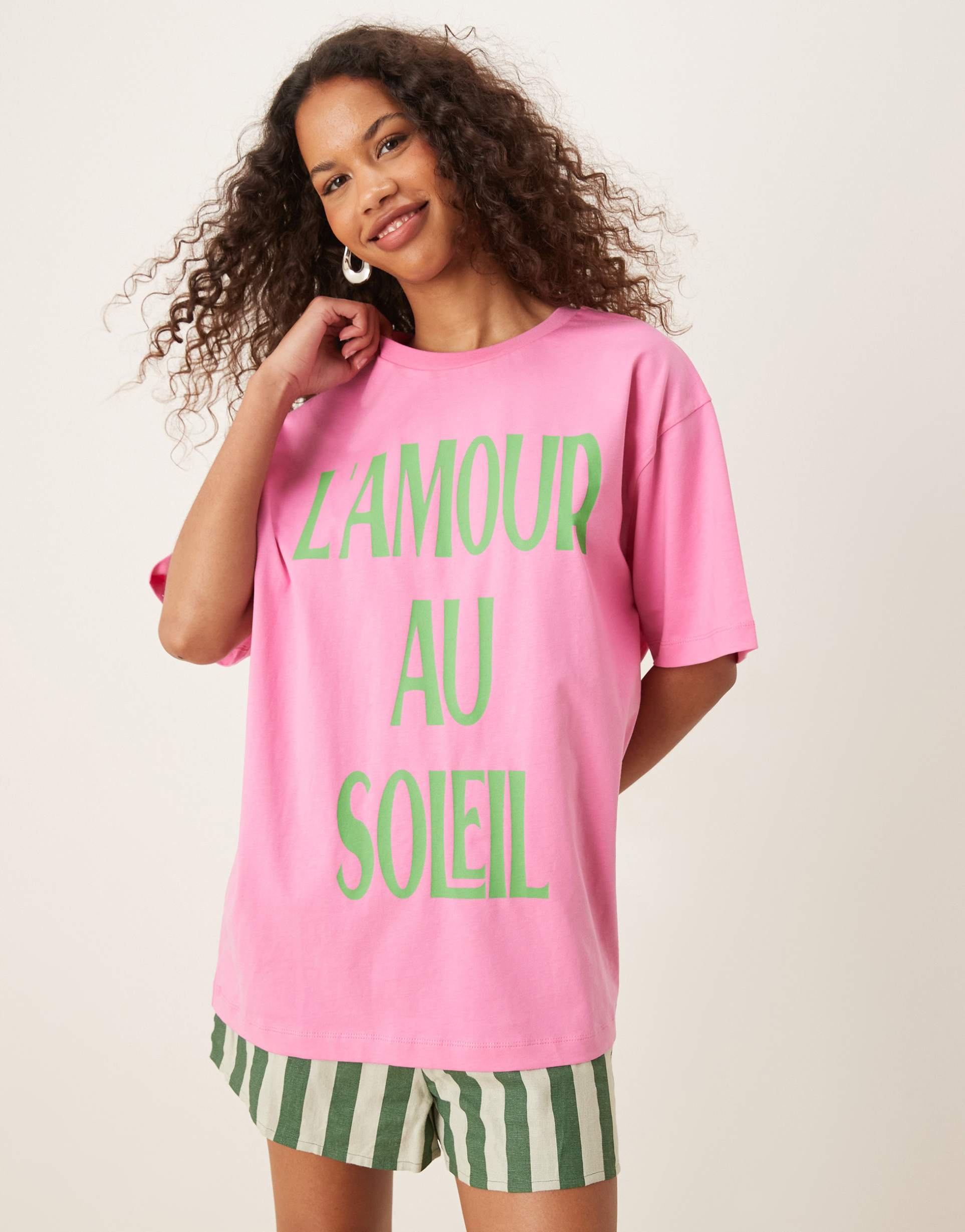 asos design regular fit t-shirt with l'amour au soleil graphic in pink