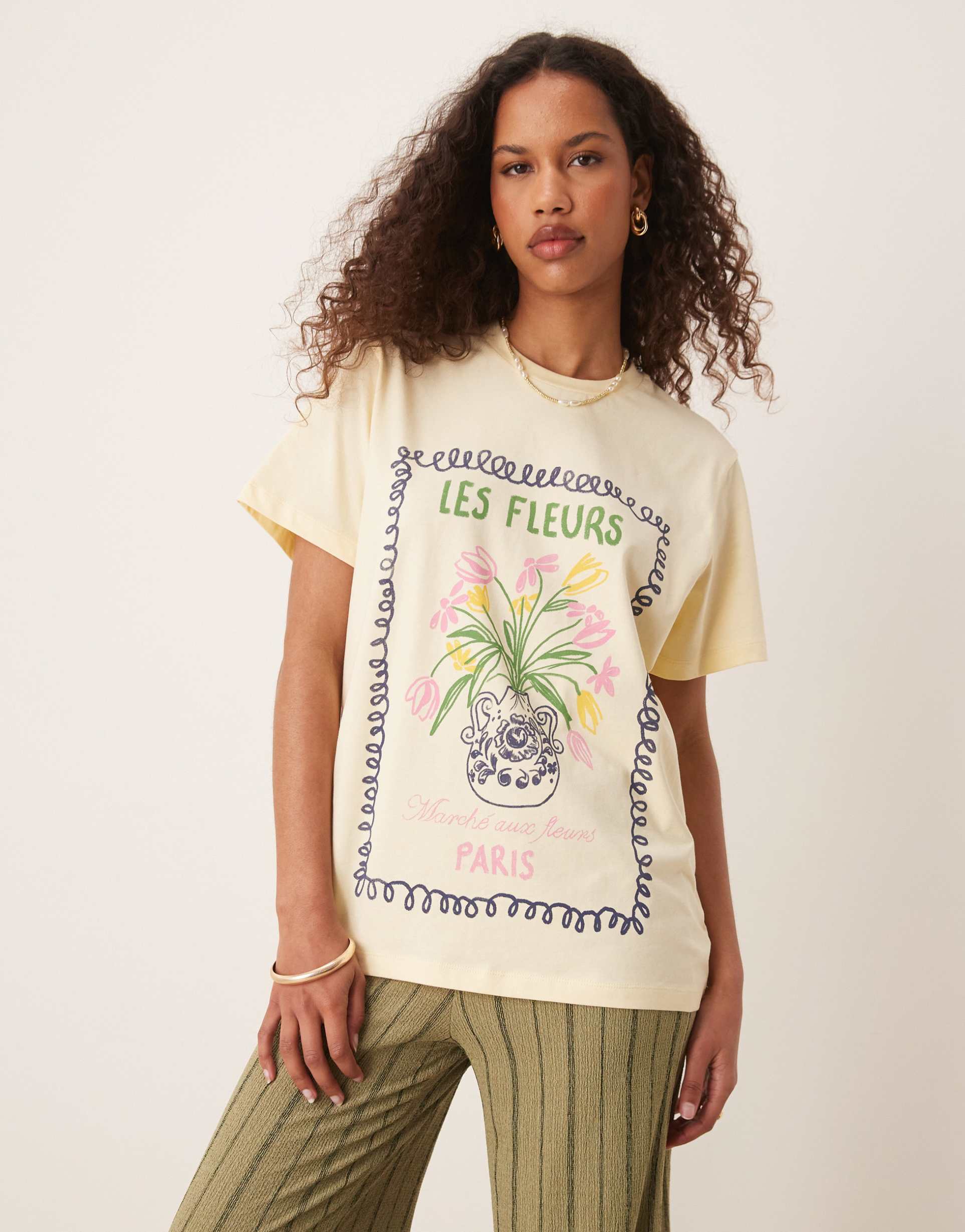 asos design regular fit t-shirt with les fleurs graphic in washed lemon