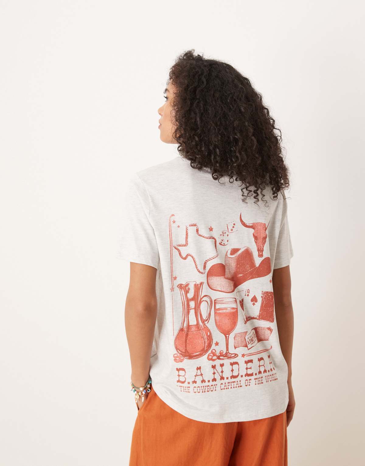 ASOS DESIGN regular fit t-shirt with rodeo cowboy graphic in ice marl