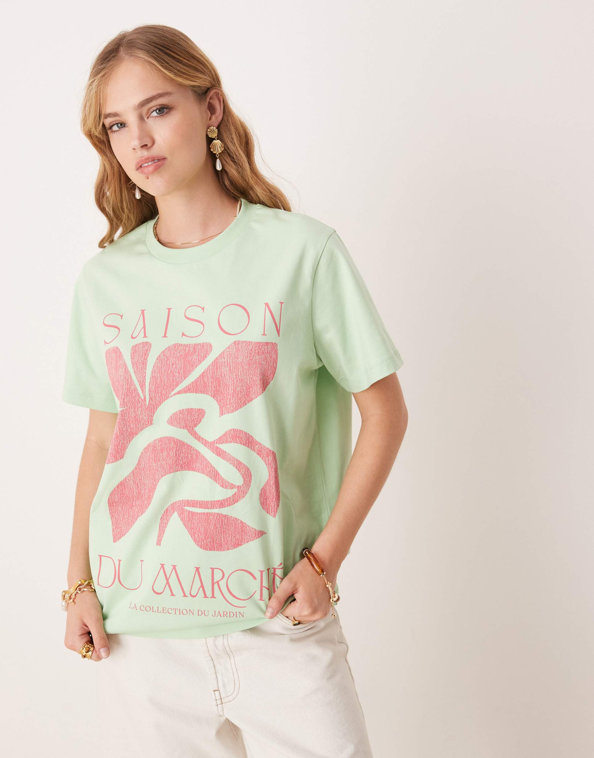 asos design regular fit t-shirt with saison du marche graphic in green