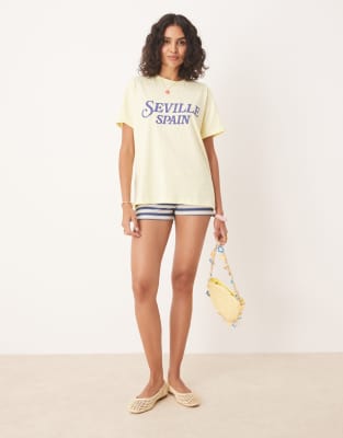 Asos Design Regular Fit T-shirt With Seville Spain Graphic In Yellow