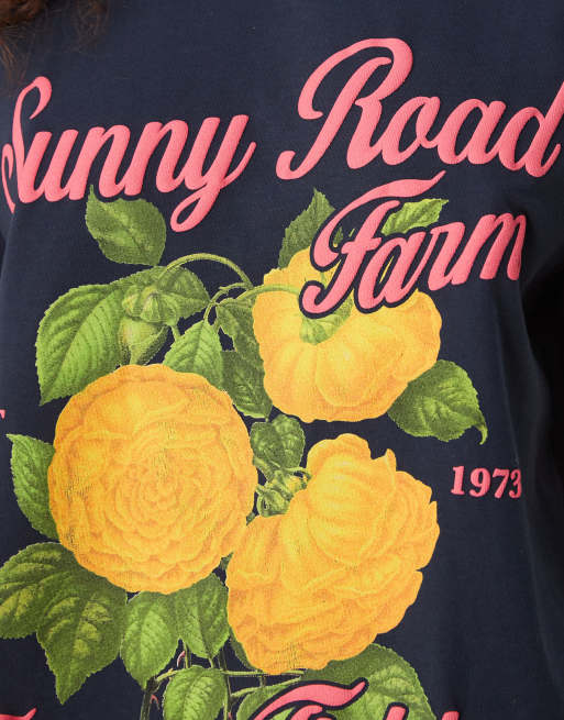 ASOS DESIGN regular fit T-shirt with sunny flower graphic in navy