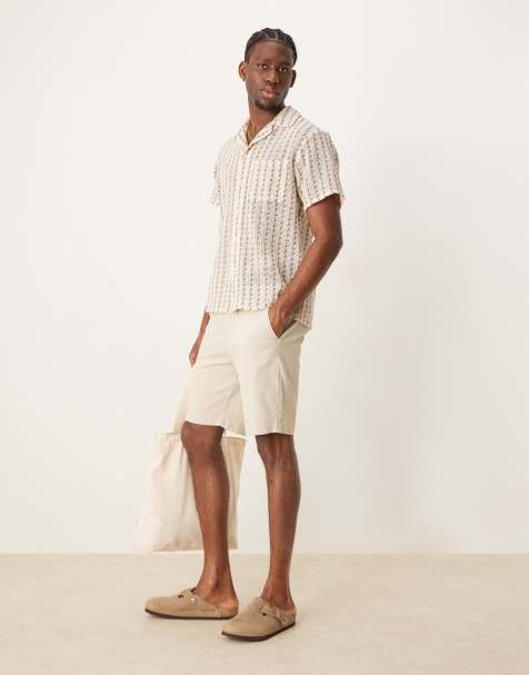 ASOS DESIGN regular length skinny chino shorts in stone - view 1