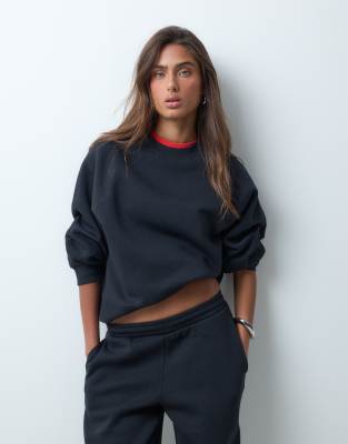 Asos Design Regular Raglan Brushback Sweatshirt In Black