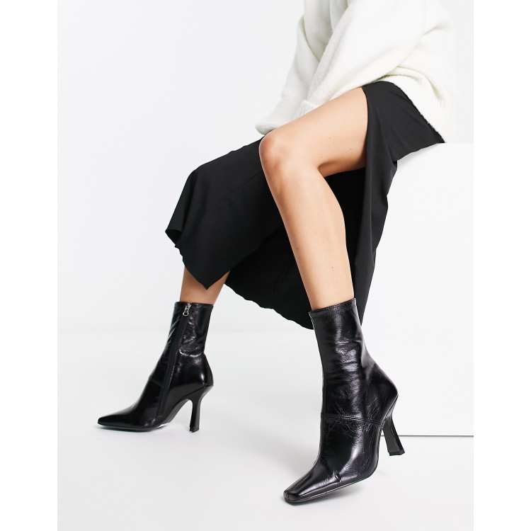 ASOS DESIGN Reign premium leather mid-heeled boots in black | ASOS