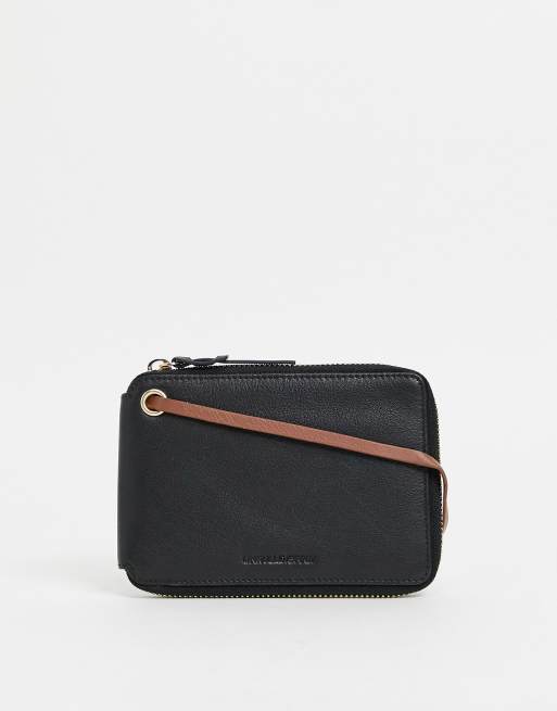 ASOS DESIGN – Reise-Brieftasche aus schwarzem Leder mit kontrastierendem, braunem Innenmaterial